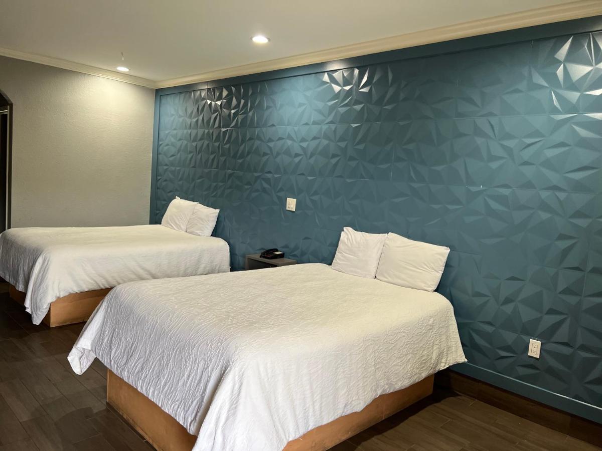The Symphony Inn & Suites ヒューストン エクステリア 写真
